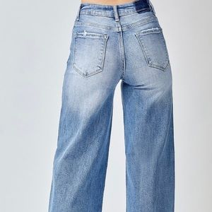 Risen Mid rise crossover wide leg jeans